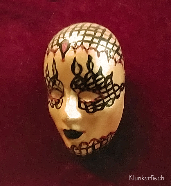 Masken-Brosche *Golden Flame*