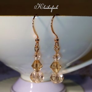 Glitzernde Bridgerton-Ohrringe in Rosa-Creme
